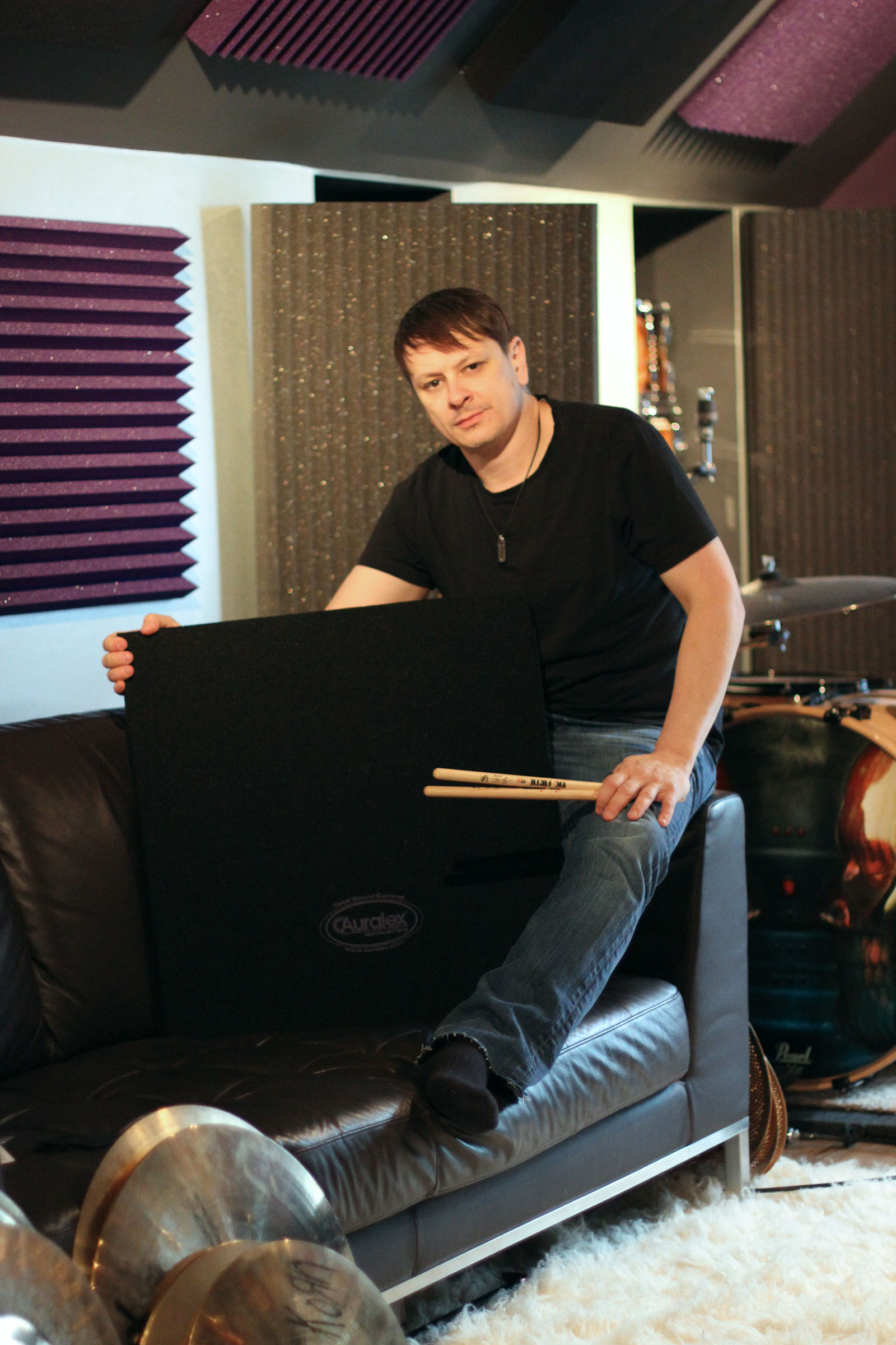Ray Luzier, pictured in his drum room/studio, outfitted with Auralex® acoustical treatment