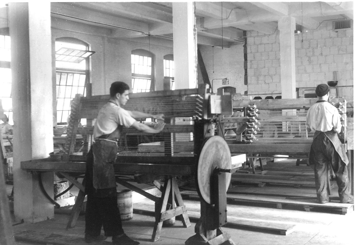 Winding gut for strings at the Astoria factory. 
