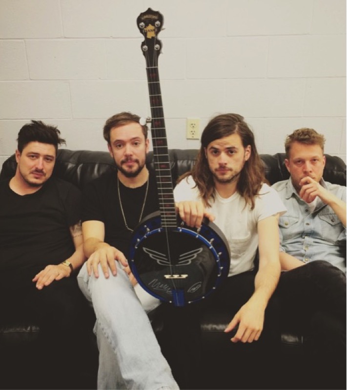Mumford & Sons with the France Charity Banjo