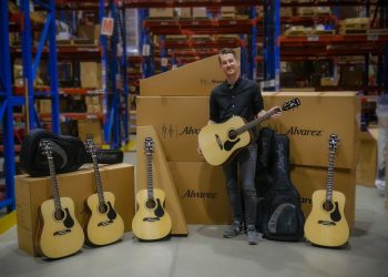 Erik Lind, Manager – Musical Instruments Business Unit, and some of the Alvarez guitars being shipped to Le Festif