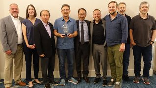 Reid Peterson (Audio-Technica U.S. Executive Director of Sales, Professional Markets); Julie Van Berg (Mavric Incorporated sales associate); Kazuo Matsushita (Audio-Technica Corporation CEO/President); Pete Petty (Mavric Incorporated principal); Manabu Aoki (Audio-Technica U.S. CEO/President); Jeff Beck (Audio-Technica U.S. Regional Sales Manager, System Solutions); and David Barrett, Jerry Silhavy and John Herr (Mavric Incorporated sales associates). Photo credit: Corey Walthall, Clyne Media