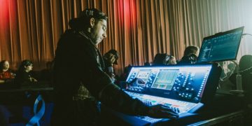 Taylor "Squid" Veraldi mixing front of house for From Ashes to New on a dLive S5000