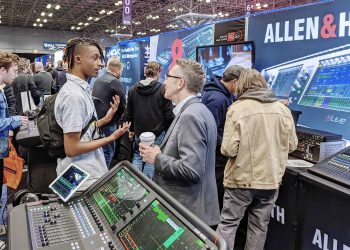 Allen & Heath USA National Sales Manager Pat McConnell speaks with a boot guest at the AES2022 Show