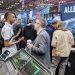 Allen & Heath USA National Sales Manager Pat McConnell speaks with a boot guest at the AES2022 Show