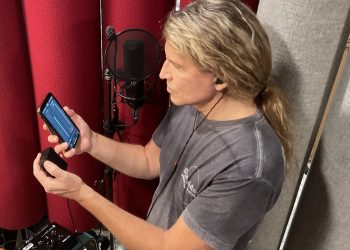 Mitch Malloy, shown in the studio using his ASI Audio x Sensaphonics 3DME Gen2 Active Ambient Monitoring System and the free ASI Audio App