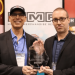 Sammy Ash is handed the 2019 MMR Don Johnson Industry Service Award by MMR executive editor Chrisitian Wissmuller
