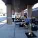 Schmidt’s Music employees (from closest to farthest) Michael Glenn, Joe Hooten, and Jeanie Harnish at an outdoor horn drive.